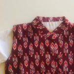 White kurta pajama with maroon ikat jacket